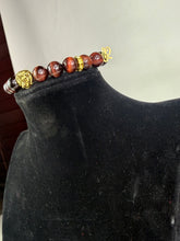 Load image into Gallery viewer, 10mm Red Tiger’s Eye- Gold Lion and Eye of Horus Bracelet (Copy)
