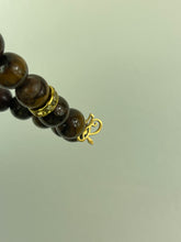 Load image into Gallery viewer, 10mm Brown Tiger’s Eye- Gold Lion and Eye of Horus Bracelet
