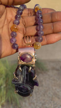 Load and play video in Gallery viewer, Amethyst Hamsa Pendant
