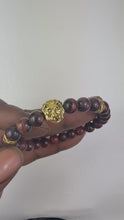 Load and play video in Gallery viewer, 8mm Red Tiger Eye Lion  Bracelet
