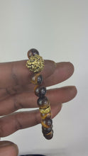 Load and play video in Gallery viewer, 8mm Tiger Eye Lion  Bracelet
