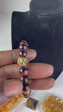 Load and play video in Gallery viewer, 10mm Red Tiger’s Eye- Gold Lion and Eye of Horus Bracelet (Copy)
