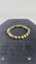 Load and play video in Gallery viewer, 8mm Brown Tiger Eye
